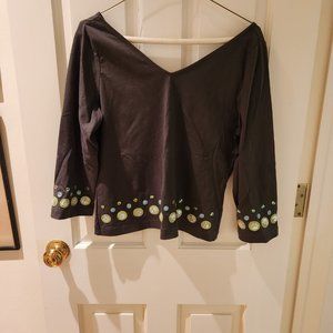 Deep V crop top with green and blue sequin detail at bottom hem.  Worth size L